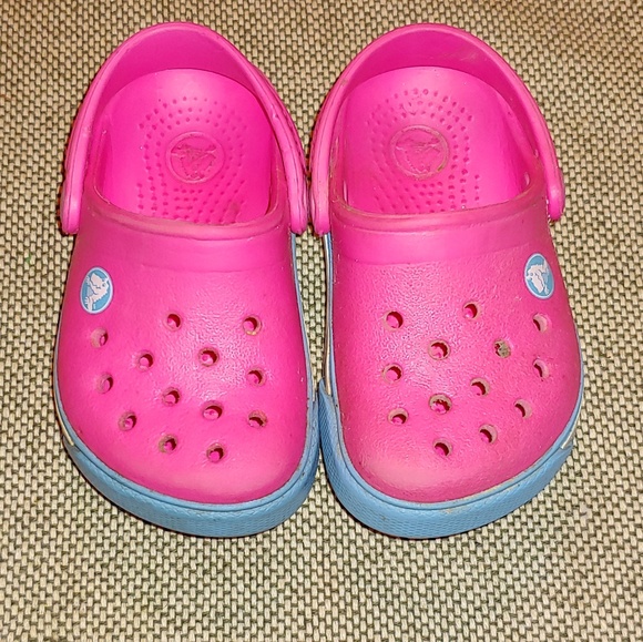 pink and blue crocs